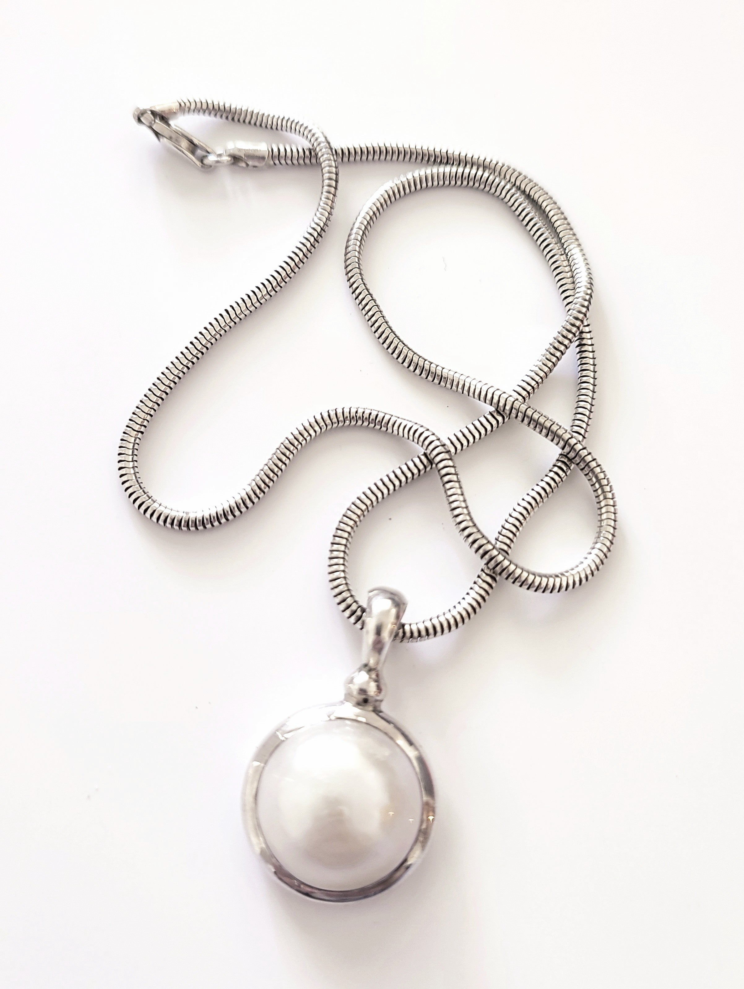 Silver necklace with large natural pearl