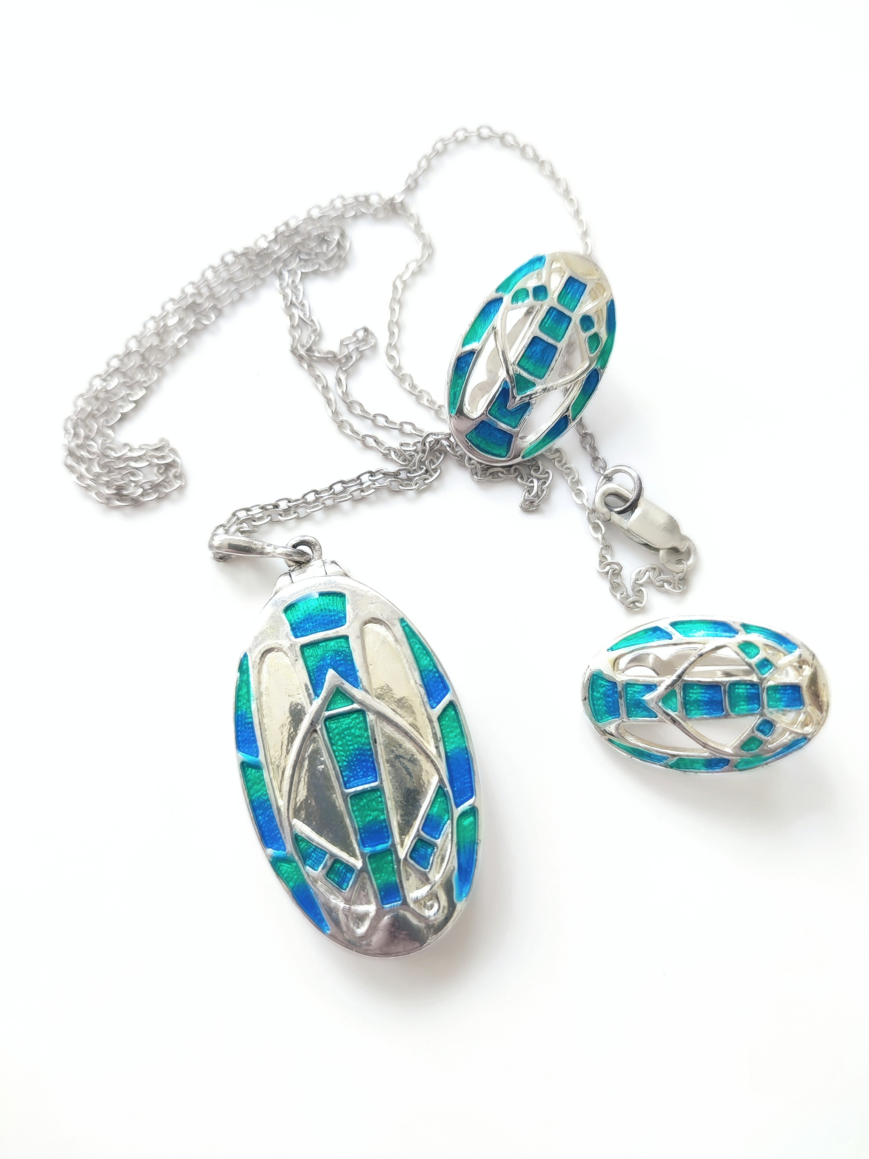 Aqua enamel locket and earrings on silver chain