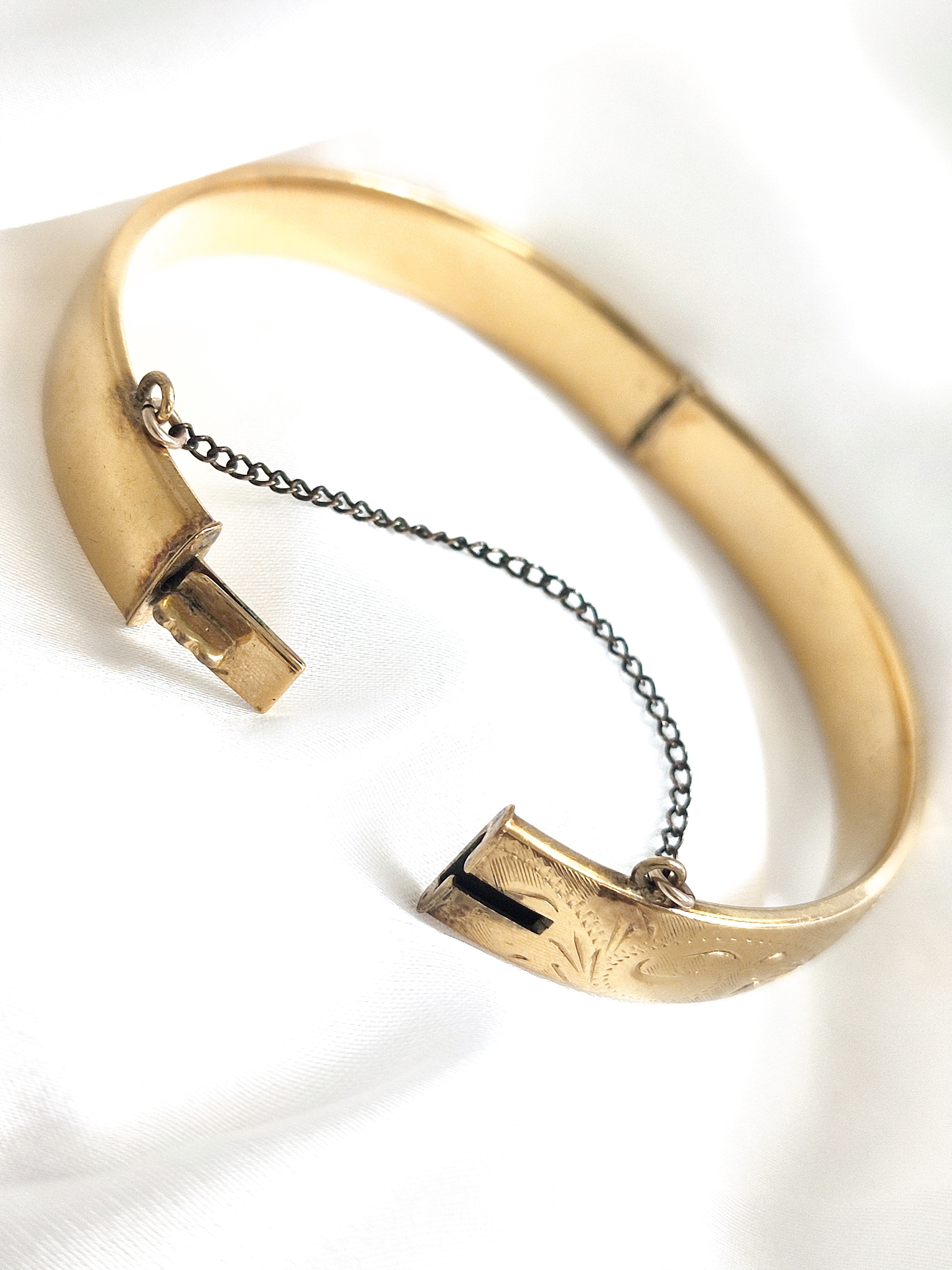 Gold rolled bangle with etched floral design