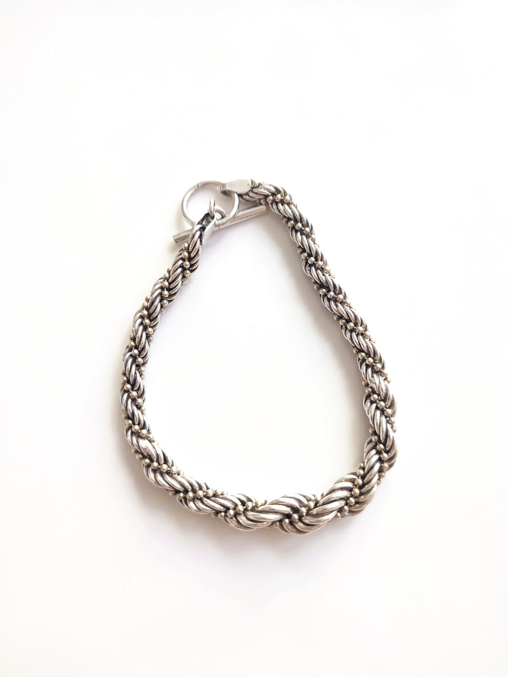 Silver twisted rope bracelet with open clasp
