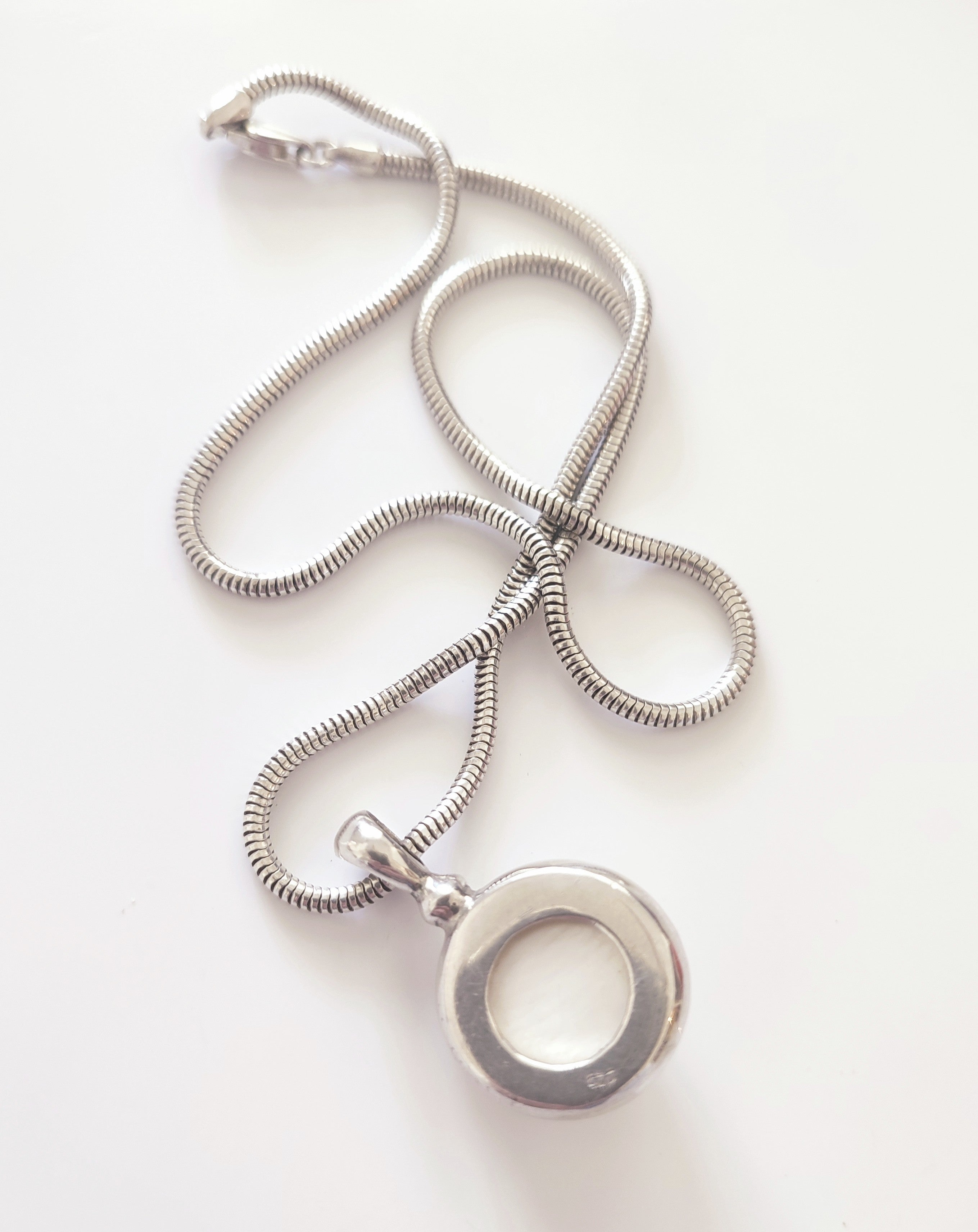 Silver necklace with large natural pearl