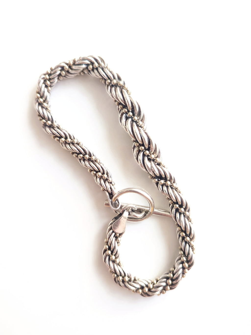 Silver twisted rope bracelet with open clasp
