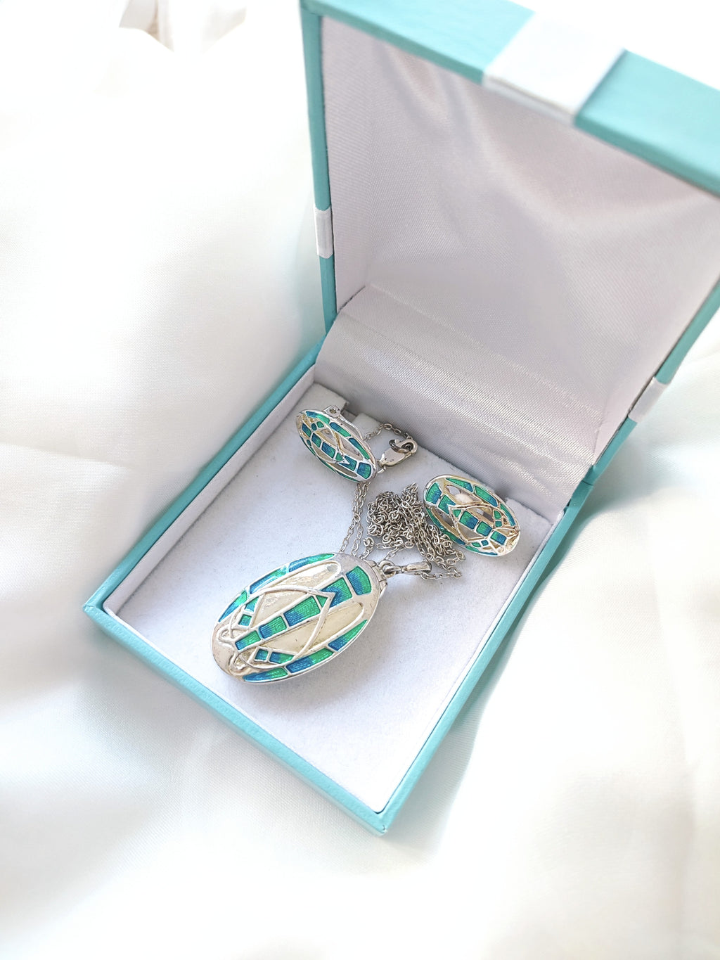 Enamel silver plated photo locket with enamel clip-on earrings