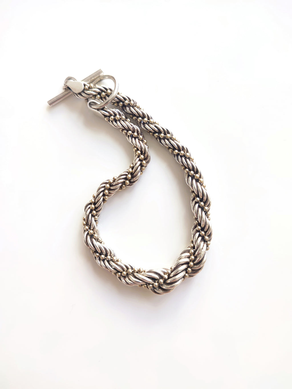 Silver twisted rope bracelet with open clasp