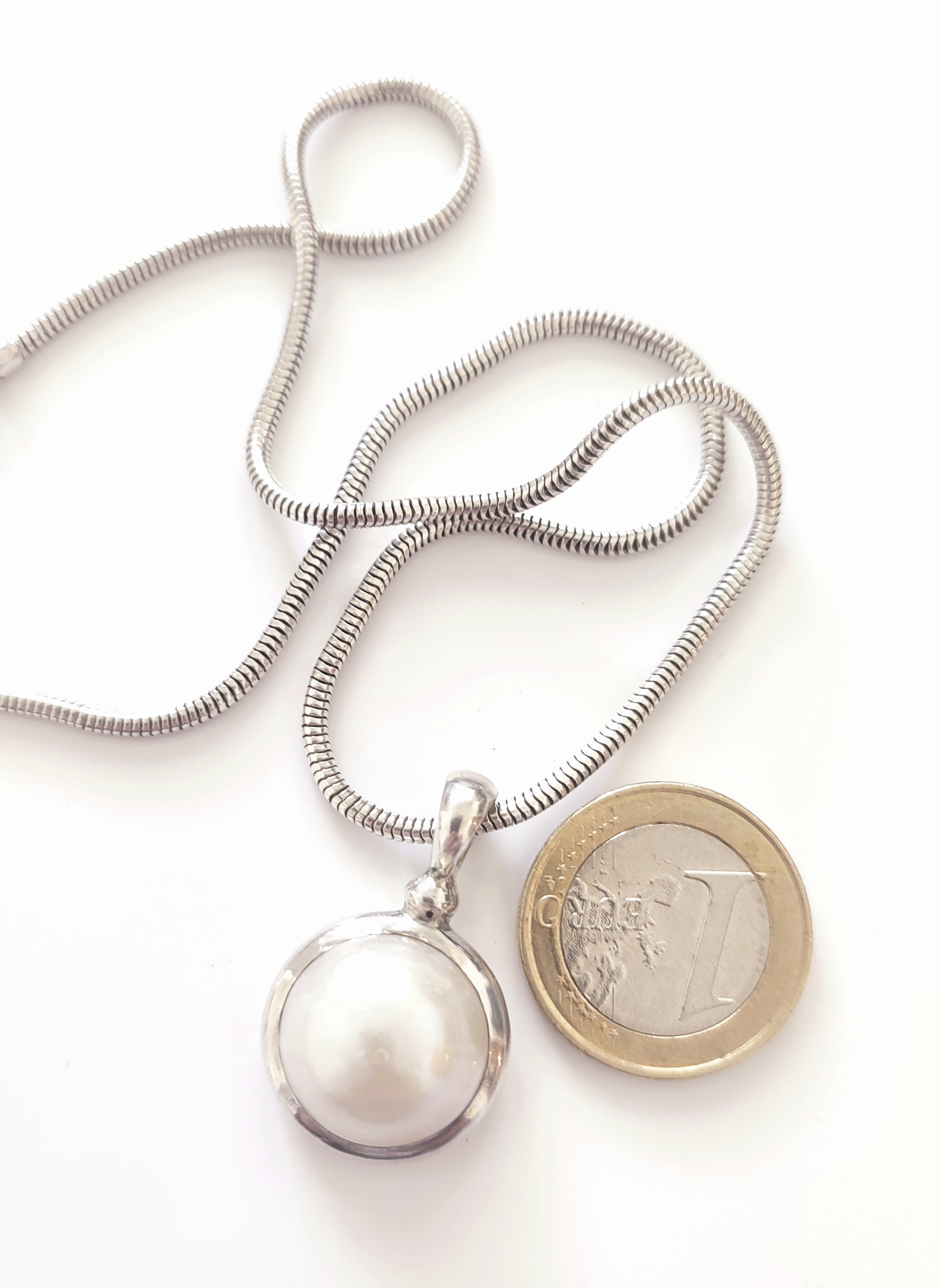 Silver necklace with large natural pearl